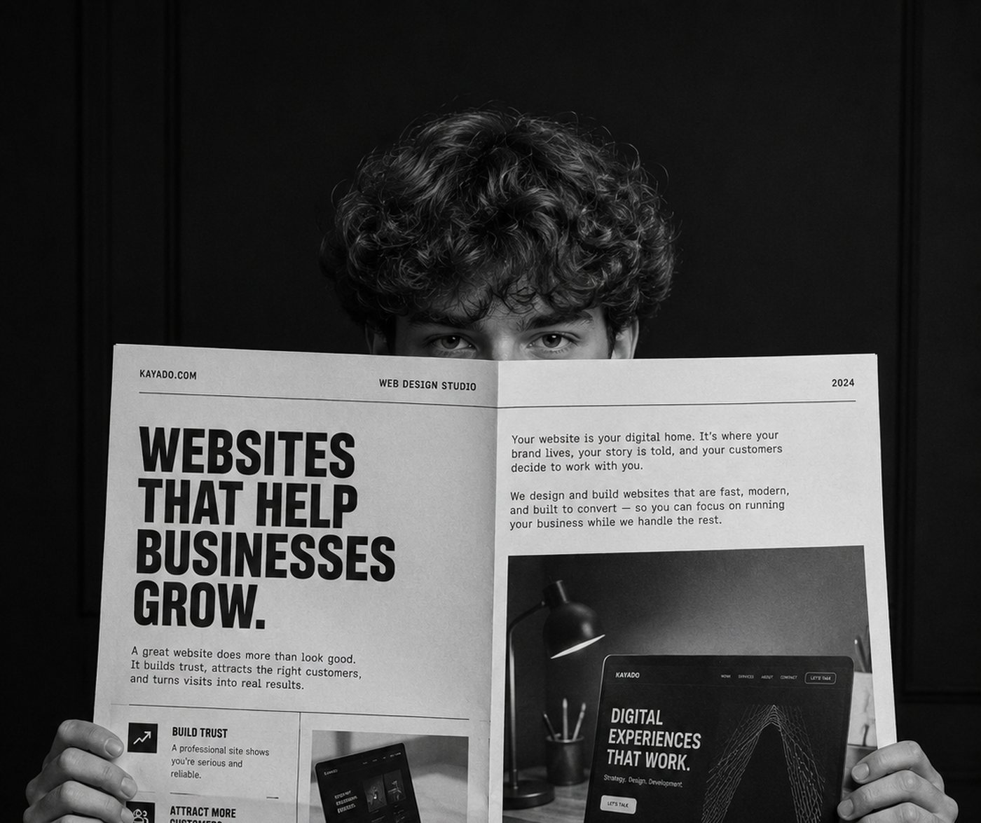 A person holding a Kayado newspaper spread headlined websites that help businesses grow